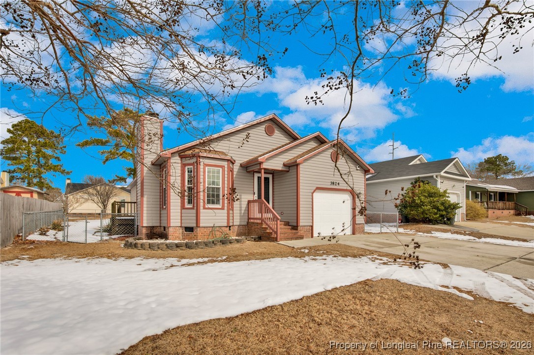 3824 Constance Road Hope Mills, NC 28348 - Photo 3 of 32 a view of a white house with a outdoor space