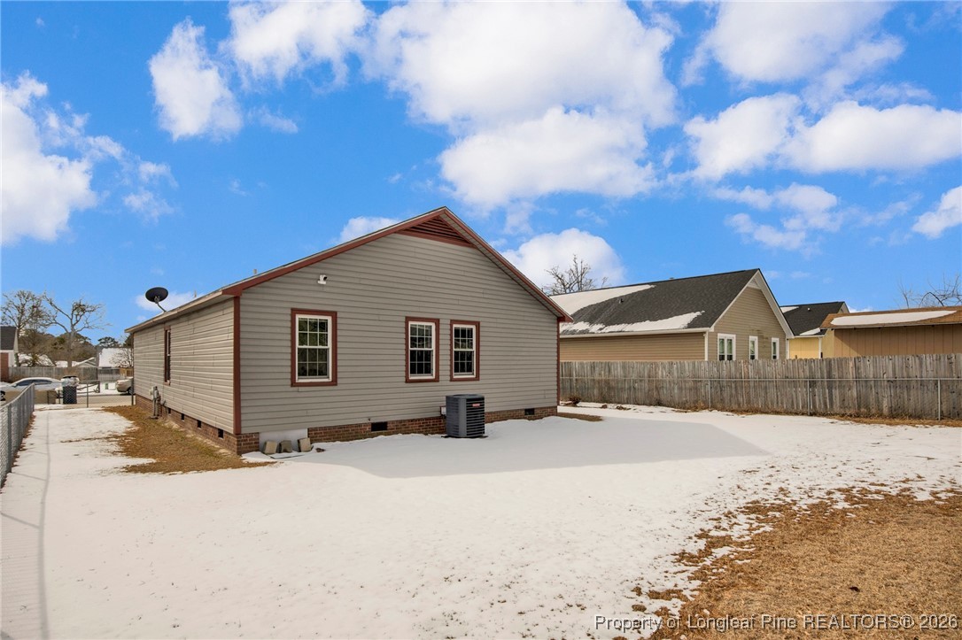 3824 Constance Road Hope Mills, NC 28348 - Photo 31 of 32 a view of a house with a yard covered in snow