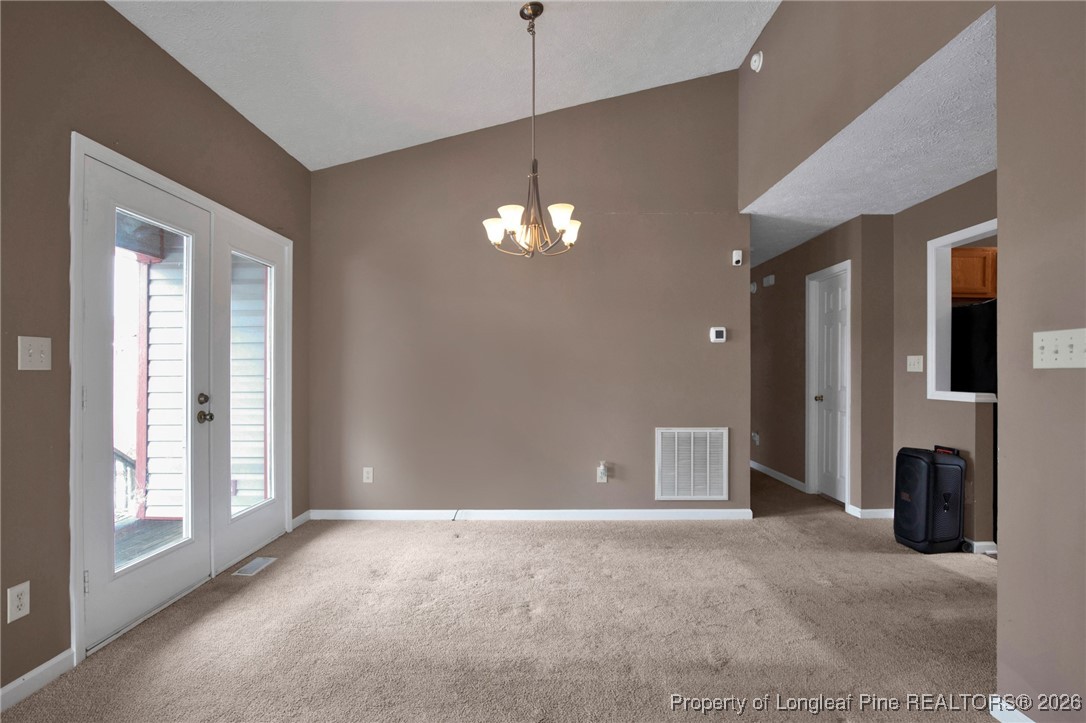 3824 Constance Road Hope Mills, NC 28348 - Photo 10 of 32 a view of a livingroom with a ceiling fan and window