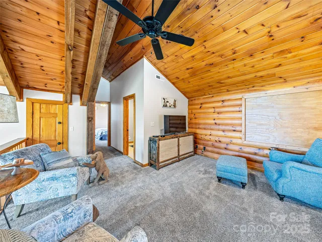 a view of living room filled with furniture