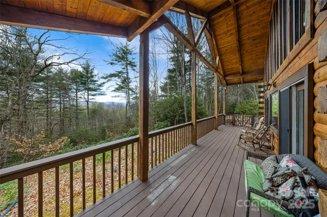 a view of balcony with furniture