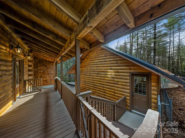 a view of a balcony with wooden floor