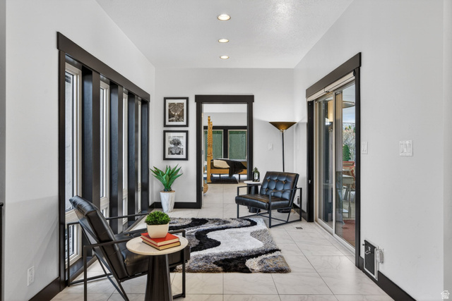 145 Carnesecca Court Mapleton, UT 84664 - Photo 45 of 109 Sitting room featuring recessed lighting and plenty of natural light