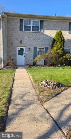 a front view of house with yard