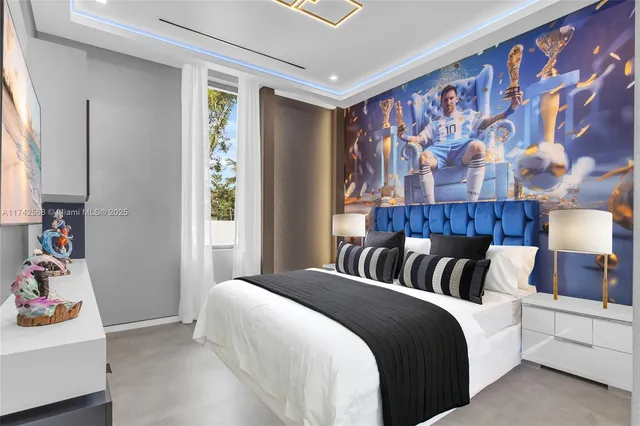 a bedroom with a bed and a lamp