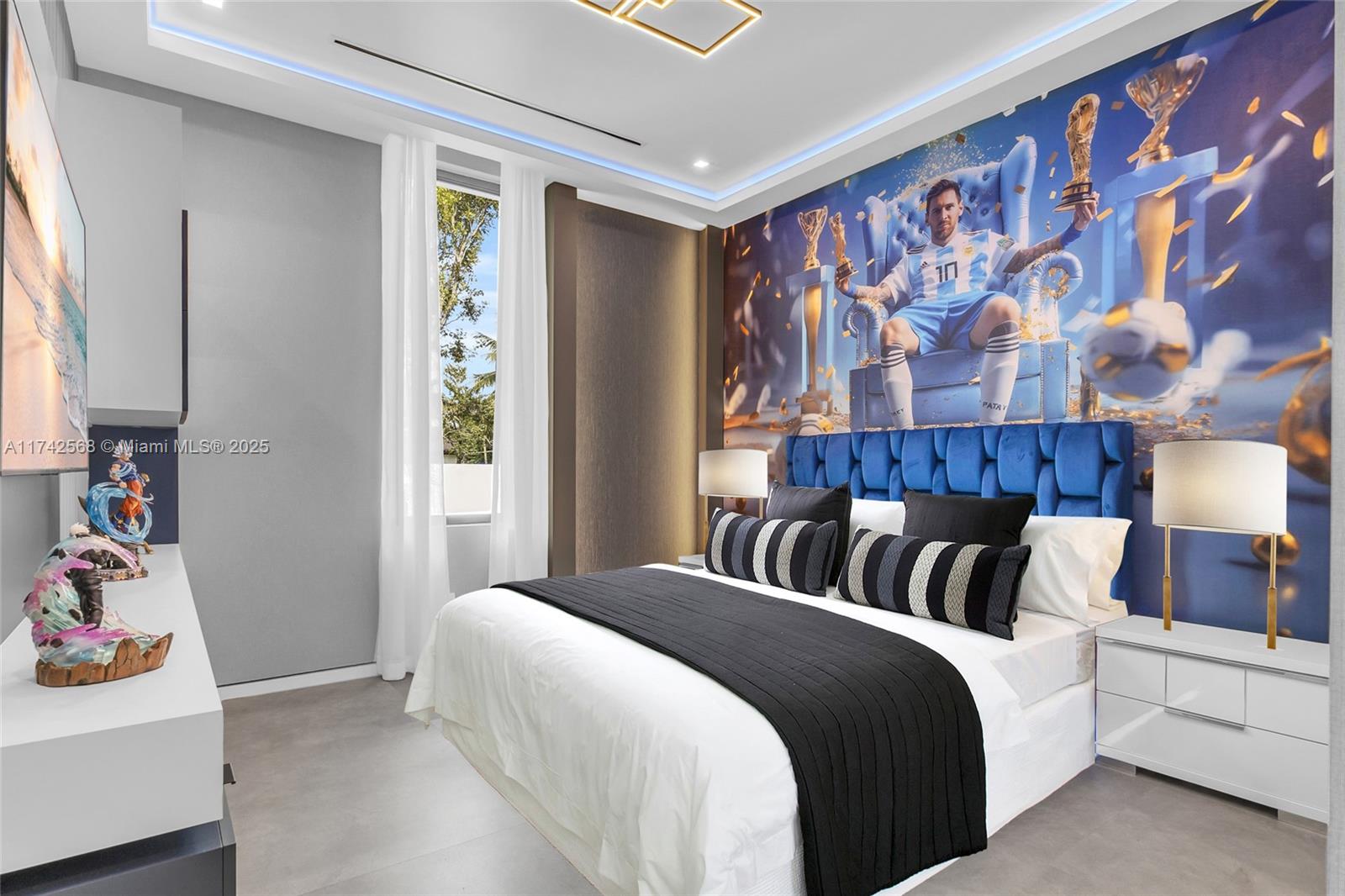 9890 Southwest 64th Street Miami, FL 33173 - Photo 24 of 61 a bedroom with bed and window