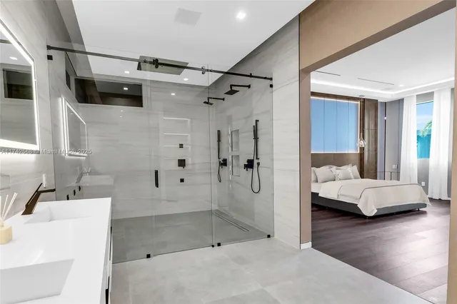 a view of gym equipment with wooden floor