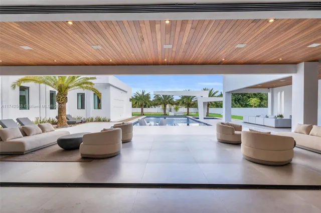 a kitchen with a sink and large window