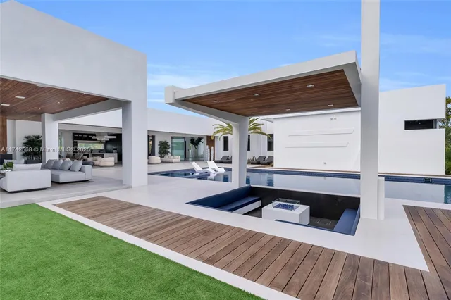 a view of a house with a yard and garage