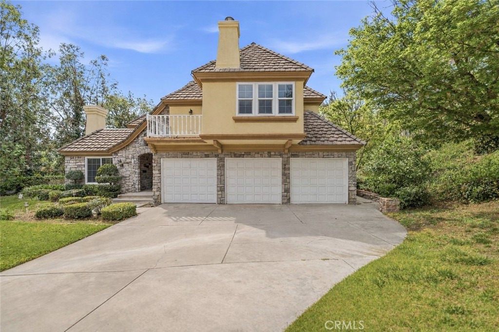 1249 Oakhaven Road Arcadia, CA 91006 - Photo 2 of 55 a front view of a house with a yard and garage