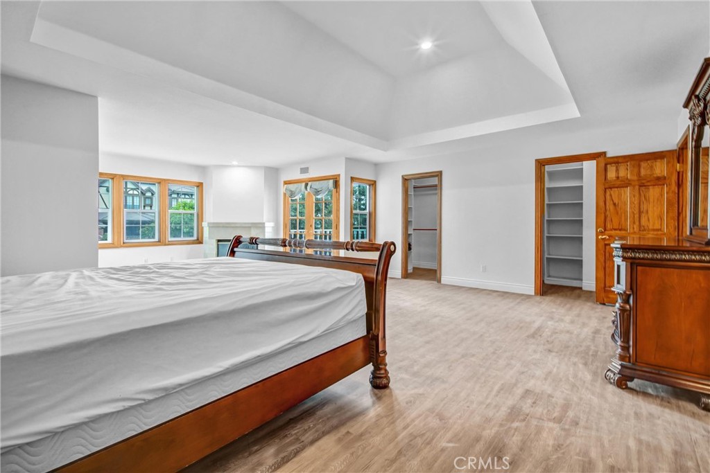 1249 Oakhaven Road Arcadia, CA 91006 - Photo 23 of 55 a bed room with a bed and large windows