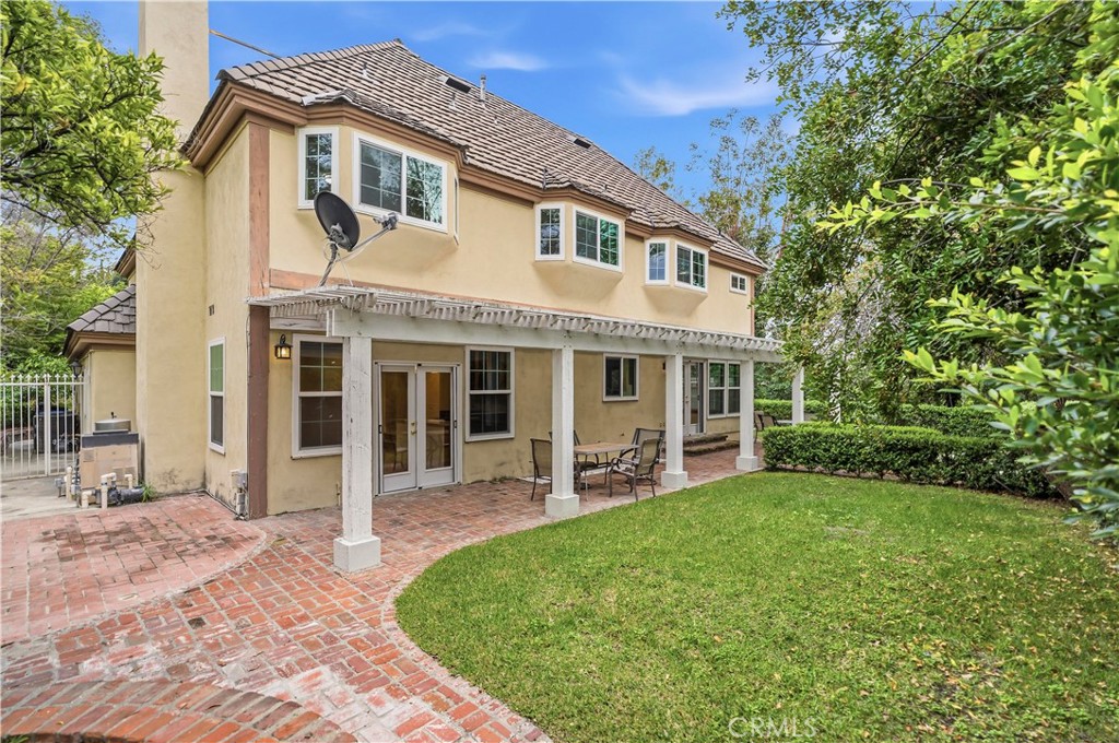 1249 Oakhaven Road Arcadia, CA 91006 - Photo 38 of 55 a front view of a house with a yard and porch