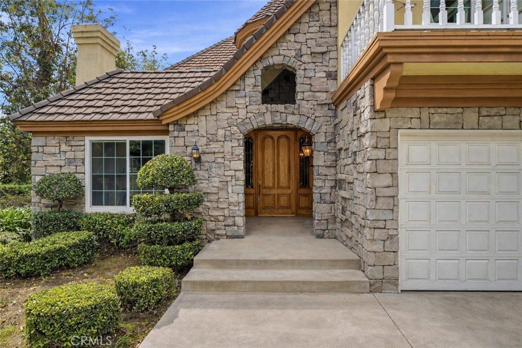 1249 Oakhaven Road Arcadia, CA 91006 - Photo 4 of 55 a front view of a house with a garden