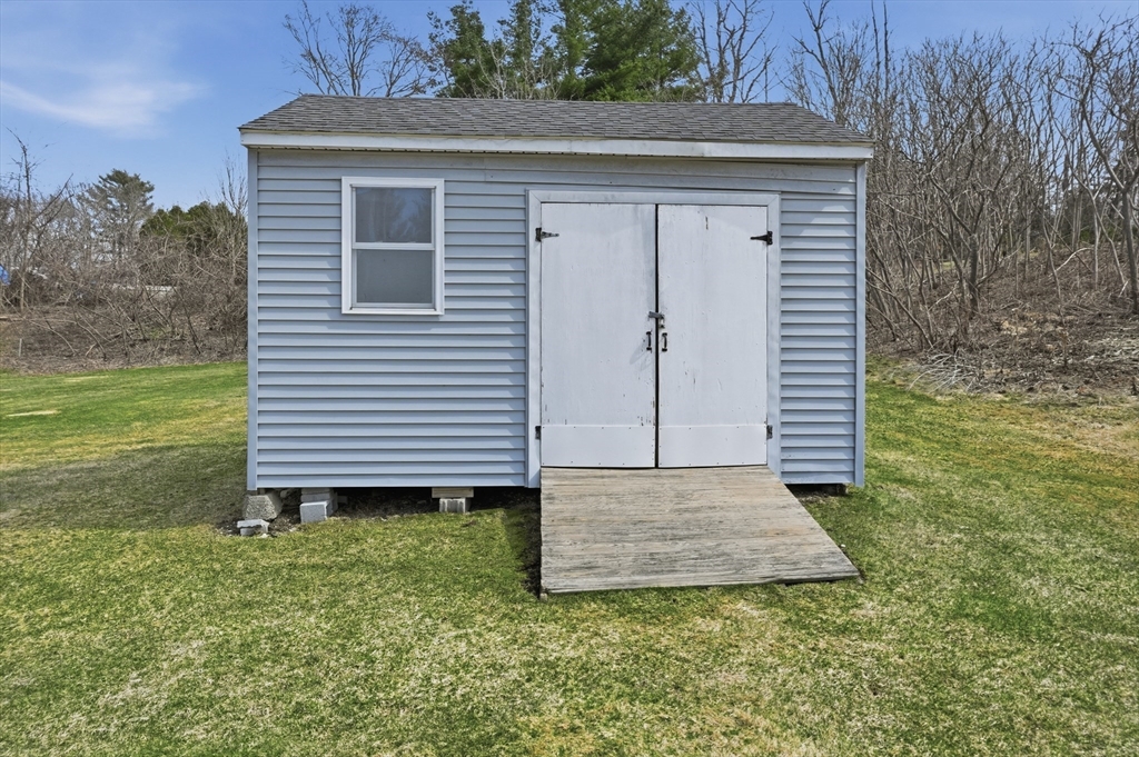 23 Bridle Path Auburn, MA 01501 - Photo 38 of 40 a view of a house with a yard