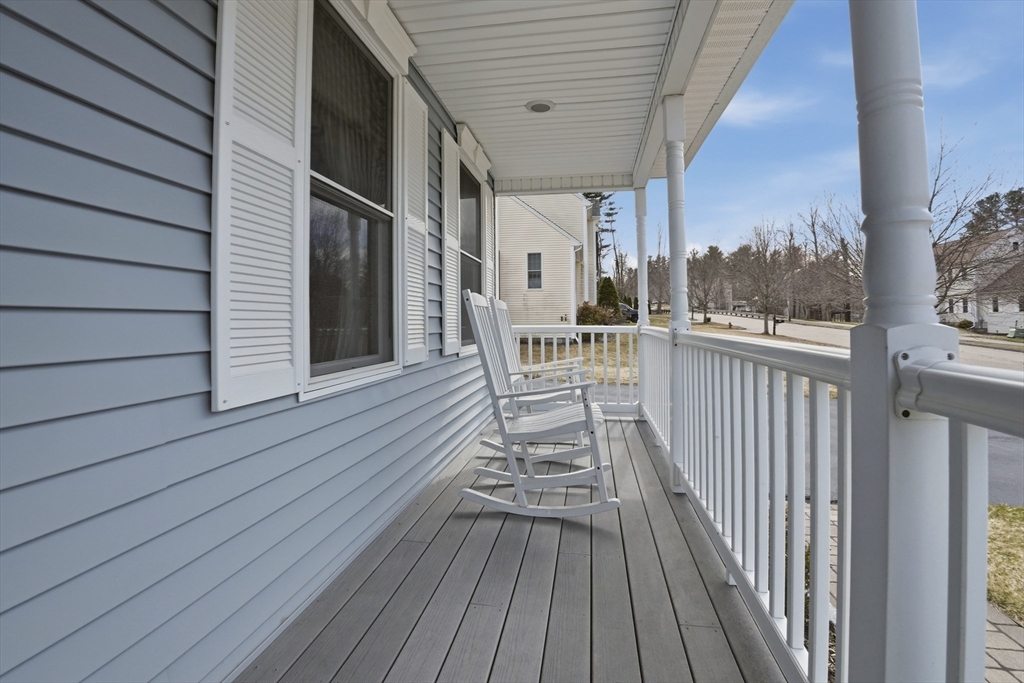 23 Bridle Path Auburn, MA 01501 - Photo 4 of 40 a view of a balcony with wooden floor