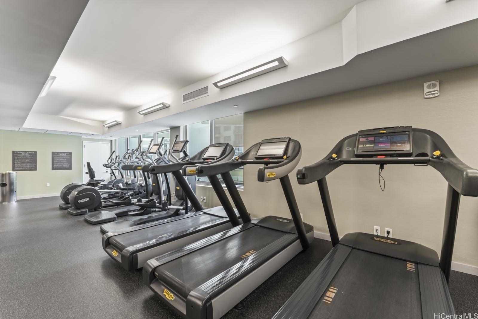 223 Saratoga Road, Unit 1102 Honolulu, HI 96815 - Photo 21 of 23 a view of a room with gym equipment