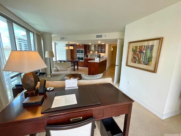 a living room with furniture and a window