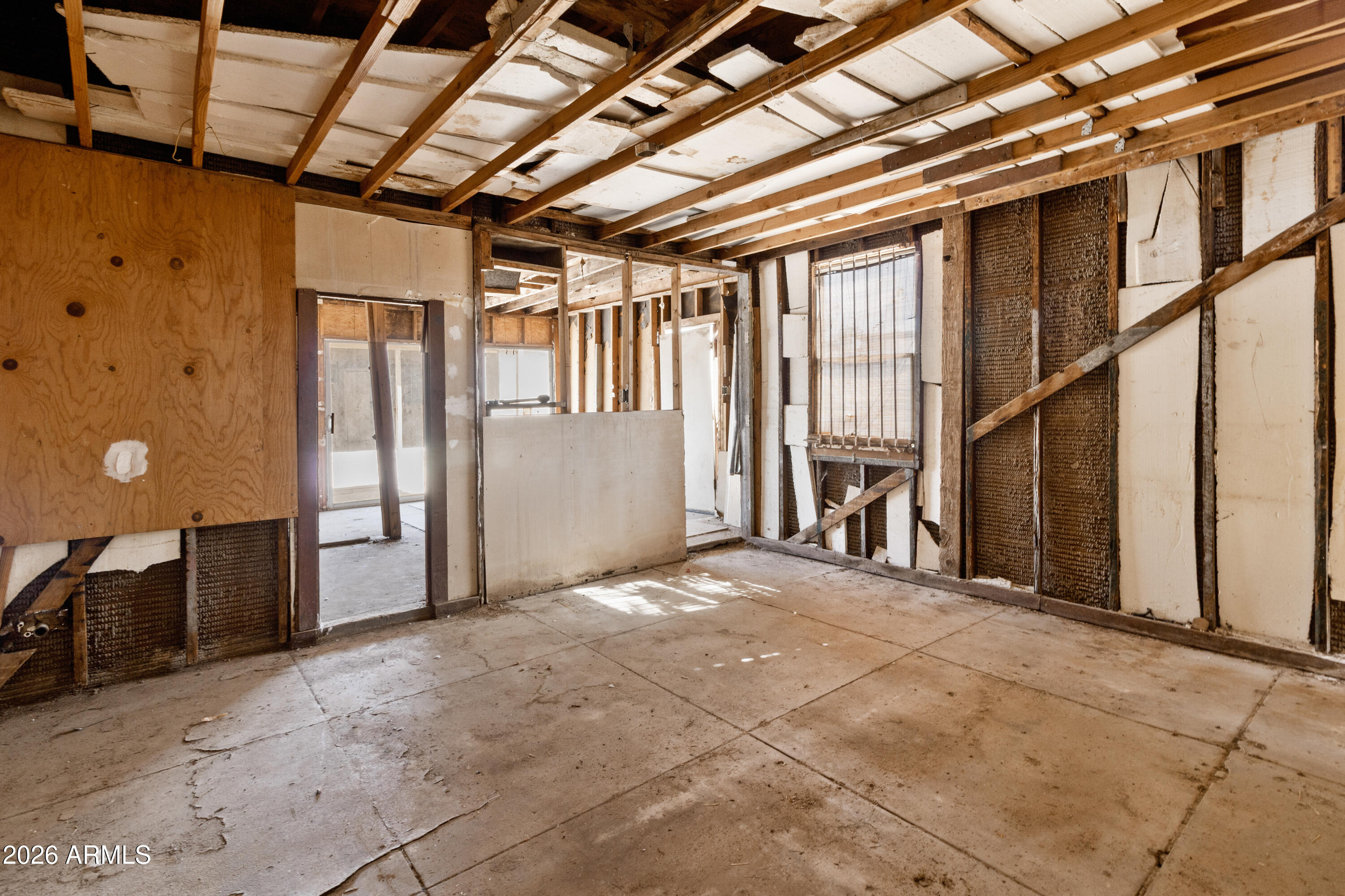 1237 East Pierce Street Phoenix, AZ 85006 - Photo 20 of 23 a view of an empty room with a window