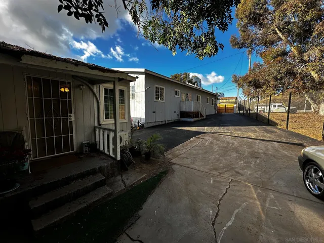 a view of a car park in front of a building