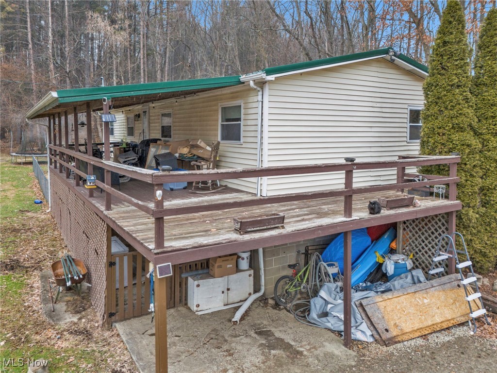 2131 Gordon Road Northwest Dover, OH 44622 - Photo 20 of 25 Back of property with a wooden deck