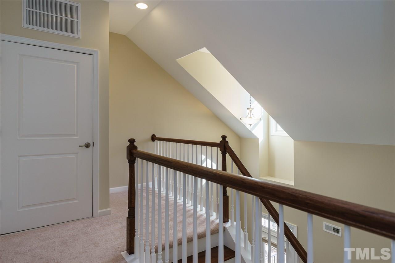 1533 Fullerton Place Raleigh, NC 27607 - Photo 18 of 25 LANDING UPSTAIRS---WOODEN SPINDLES PROVIDE AIRY FEEL COMING UP THE STAIRCASE AND CARPET LIKE NEW!