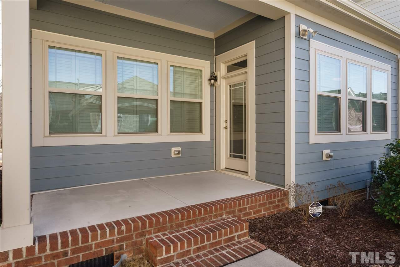1533 Fullerton Place Raleigh, NC 27607 - Photo 22 of 25 COZY PATIO ON REAR SIDE OF HOME, PERFECT FOR ENJOYING AN AFTERNOON OUTSIDE.