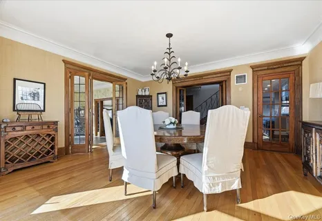 a spacious bathroom with a granite countertop sink mirror and window