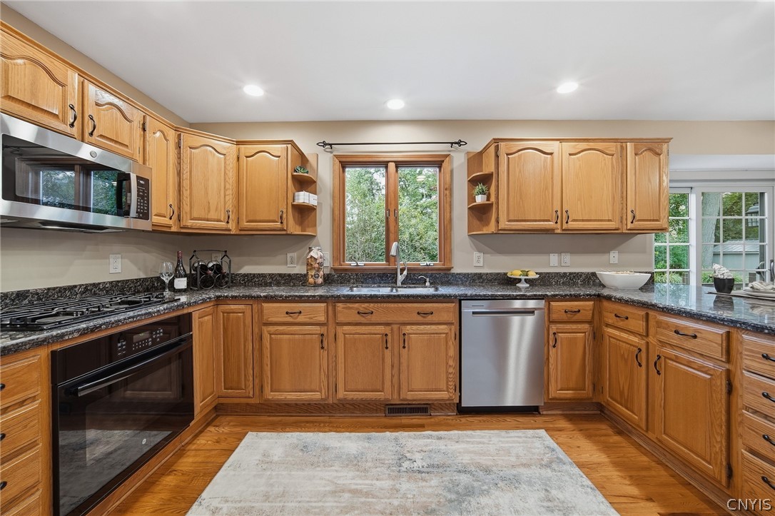 4084 Cortina Road Lysander, NY 13027 - Photo 18 of 48 The extensive granite counters afford so much work