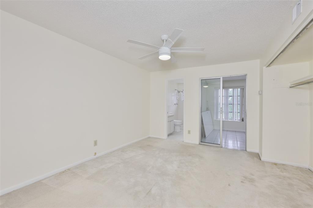 2358 Ecuadorian Way, Unit 56 Clearwater, FL 33763 - Photo 14 of 33 an empty room with a bathroom