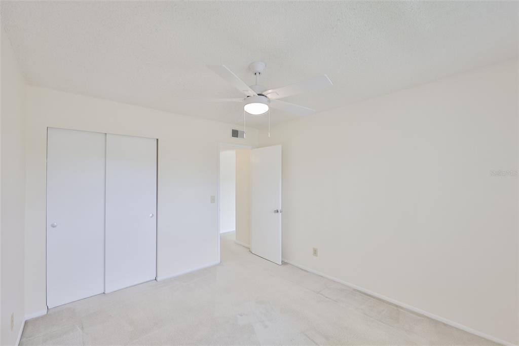 2358 Ecuadorian Way, Unit 56 Clearwater, FL 33763 - Photo 16 of 33 a view of an empty room