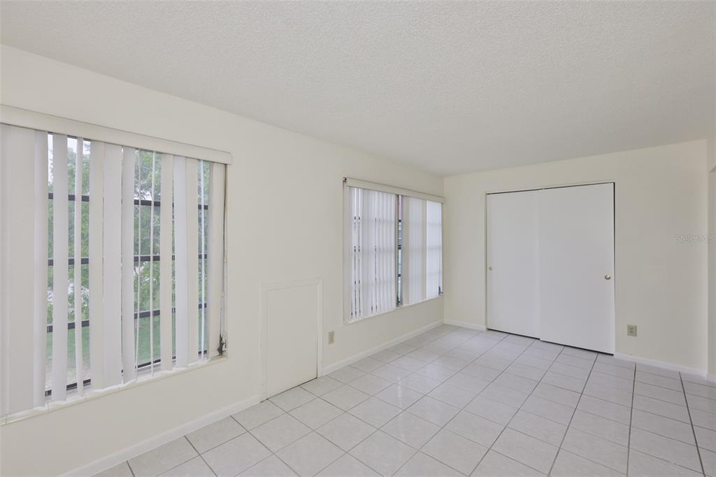 2358 Ecuadorian Way, Unit 56 Clearwater, FL 33763 - Photo 21 of 33 a view of an empty room with window
