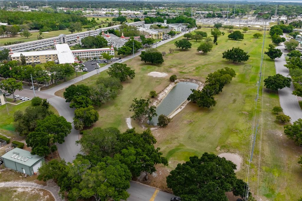 2358 Ecuadorian Way, Unit 56 Clearwater, FL 33763 - Photo 30 of 33 an aerial view of residential houses with outdoor space and trees
