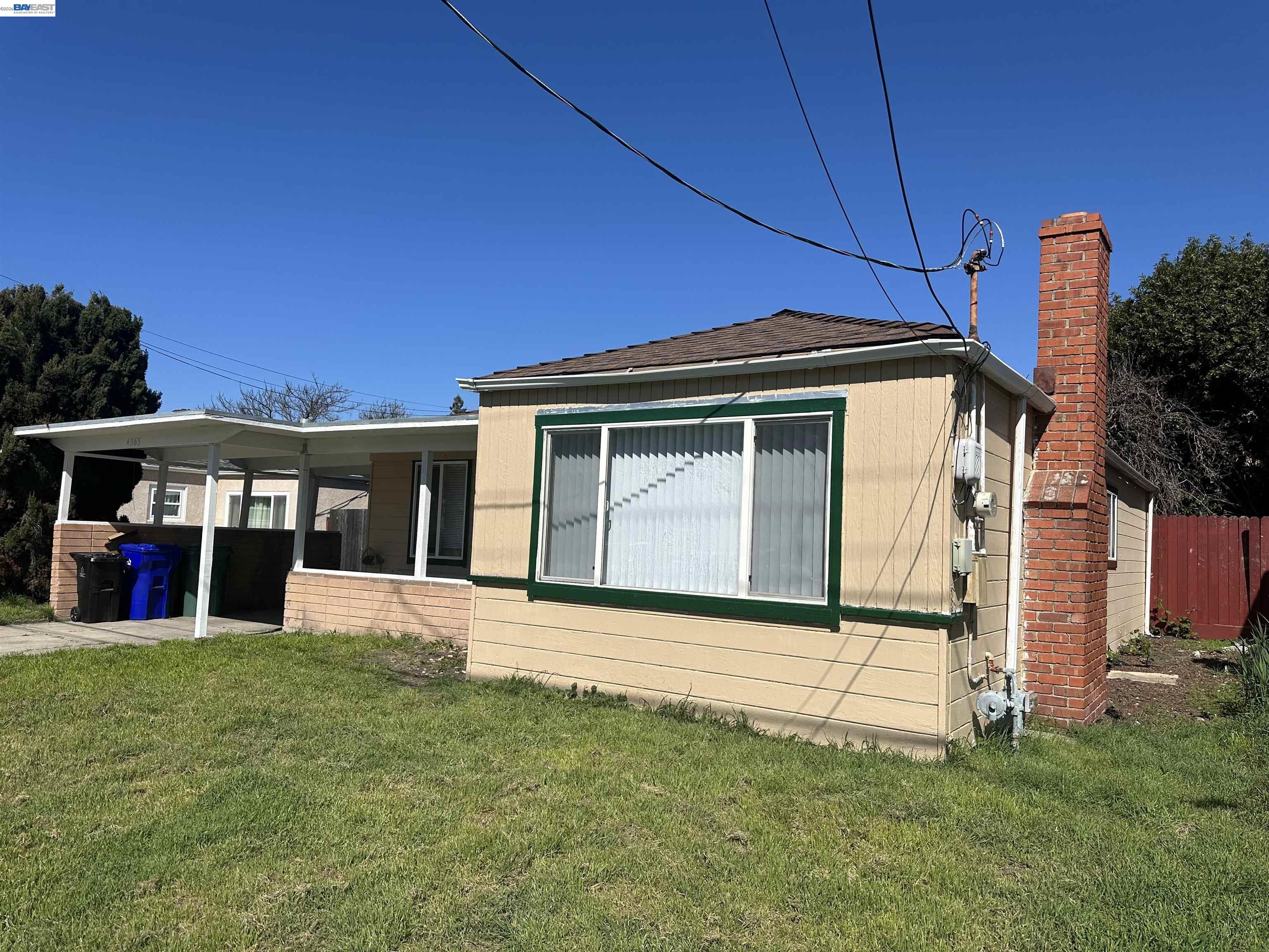 4363 Wesley Way El Sobrante, CA 94803 - Photo 2 of 11 a view of a house with a yard