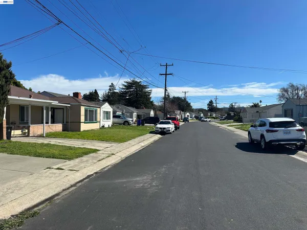 a view of a car parked in front of a house