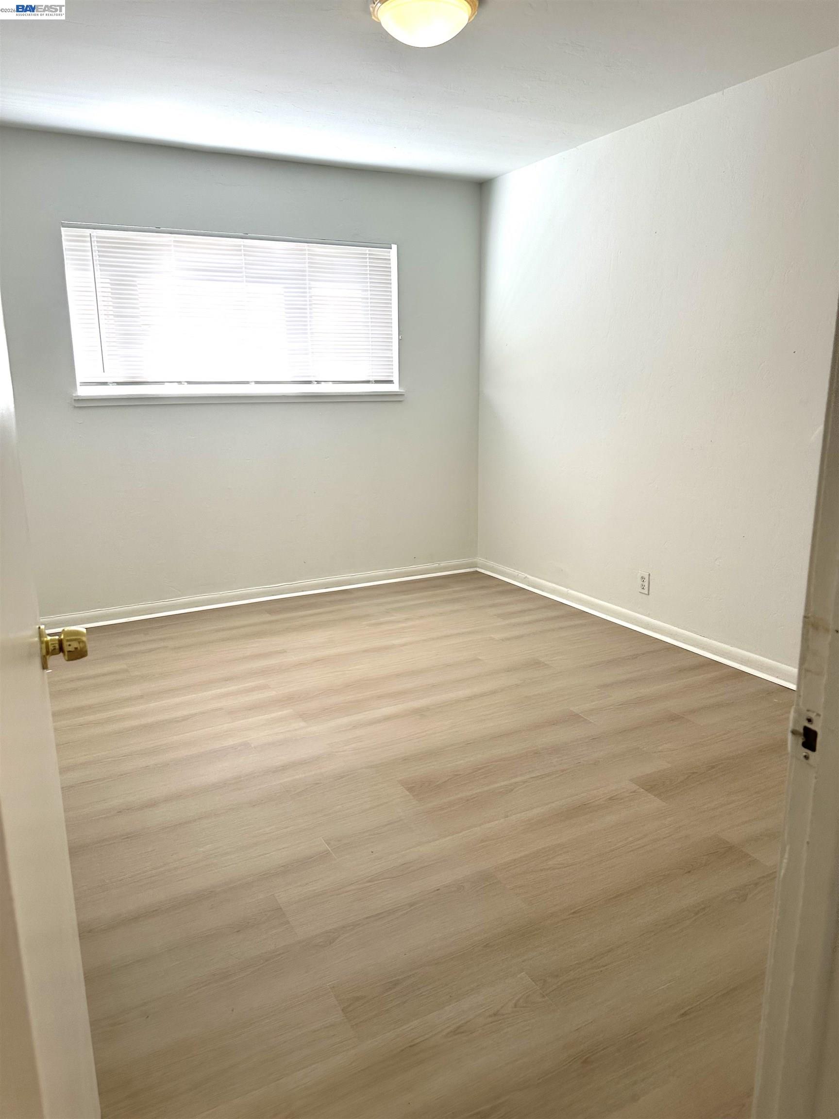 4363 Wesley Way El Sobrante, CA 94803 - Photo 8 of 11 a view of an empty room with a window
