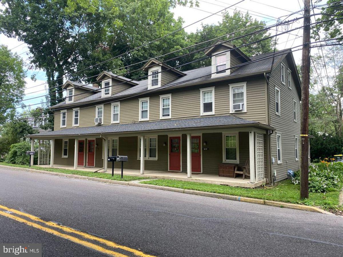 908 Easton Road Riegelsville, PA 18077 - Photo 1 of 43 a front view of a house with a garden