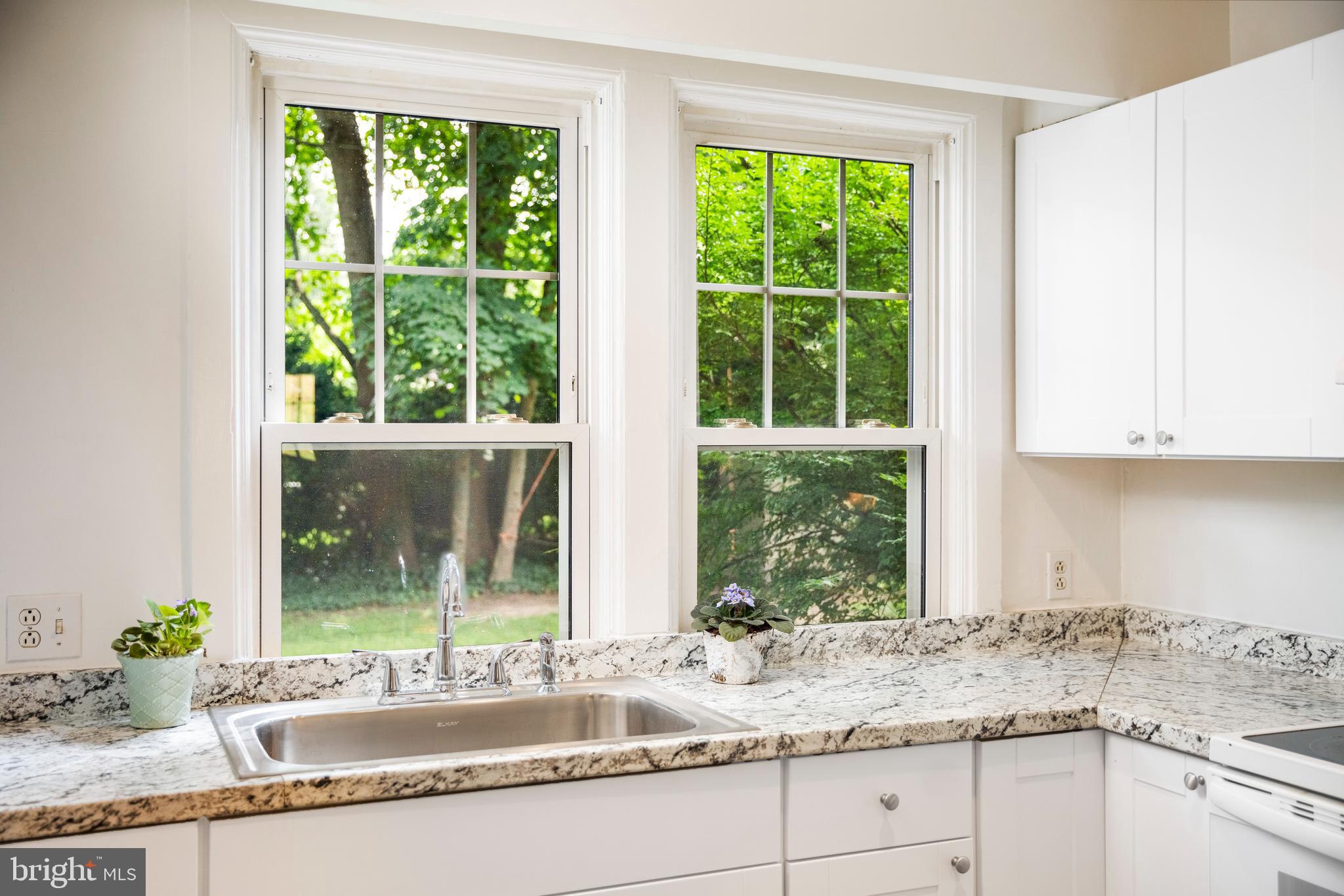 908 Easton Road Riegelsville, PA 18077 - Photo 29 of 43 a kitchen with granite countertop a window and a sink