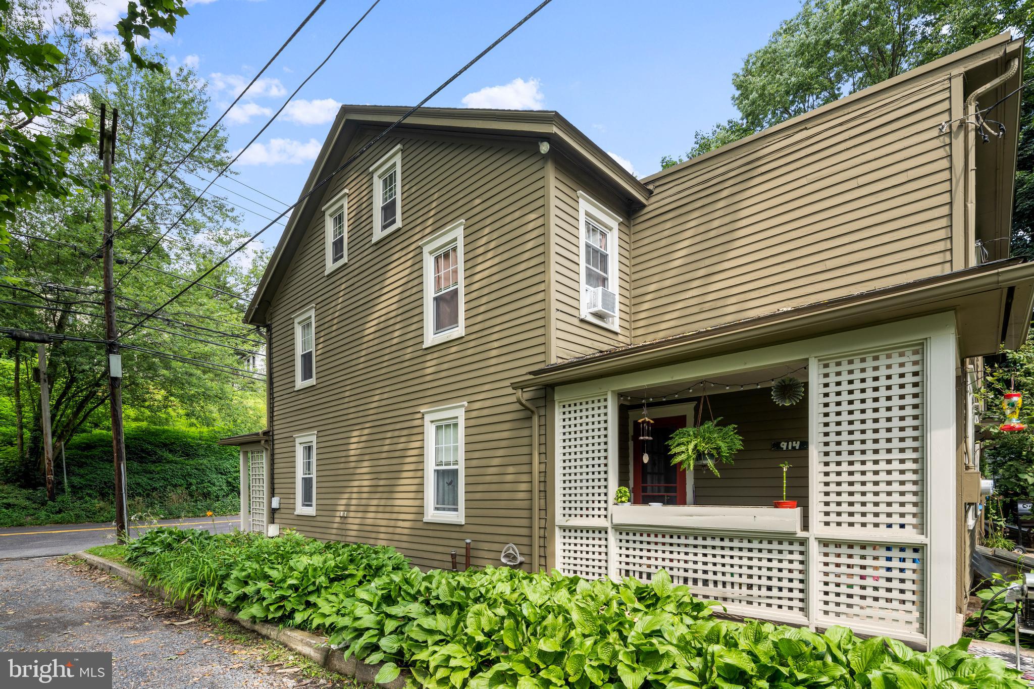 908 Easton Road Riegelsville, PA 18077 - Photo 37 of 43 a front view of a house with plants