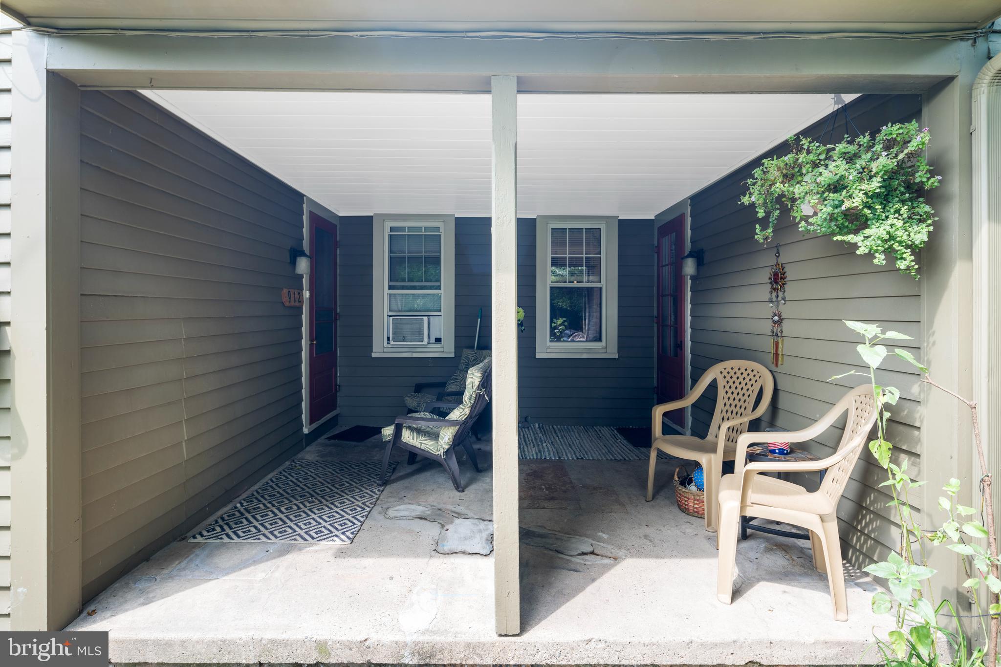 908 Easton Road Riegelsville, PA 18077 - Photo 38 of 43 a backyard of a house with chairs table and chairs