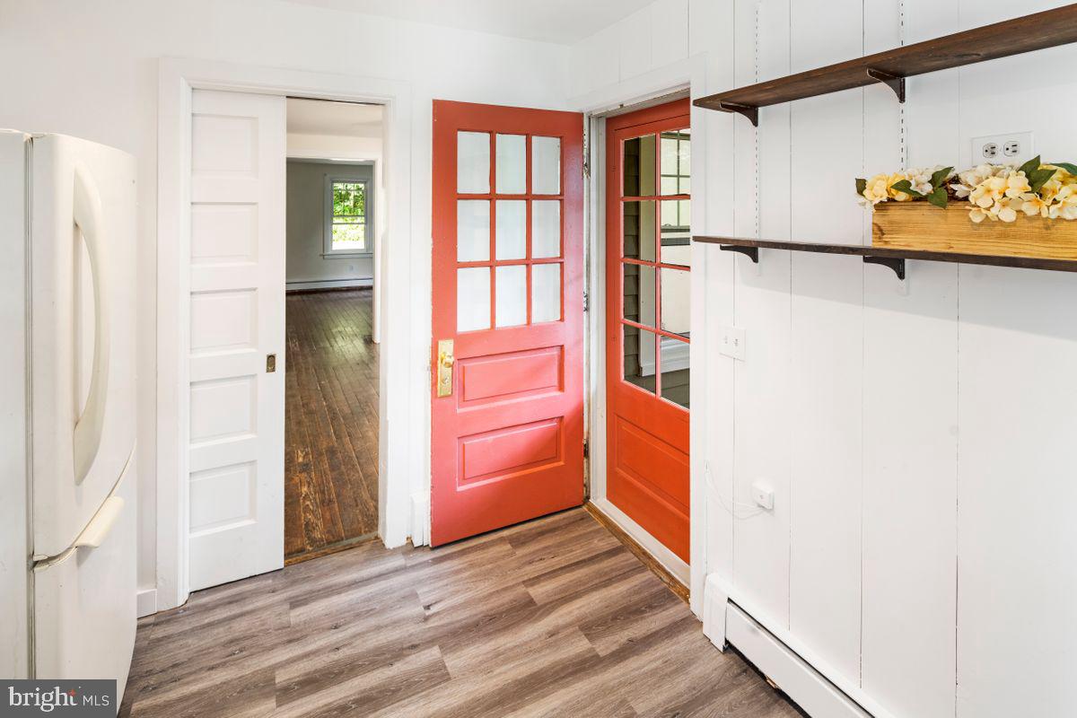 908 Easton Road Riegelsville, PA 18077 - Photo 7 of 43 a view of an entryway with wooden floor