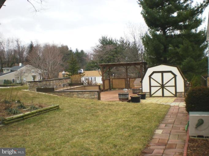 6307 Chesworth Road Catonsville, MD 21228 - Photo 16 of 18 Brick walkway to Barn like shed