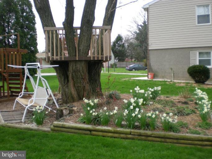 6307 Chesworth Road Catonsville, MD 21228 - Photo 18 of 18 Serene landcaped area to relax with kids play area