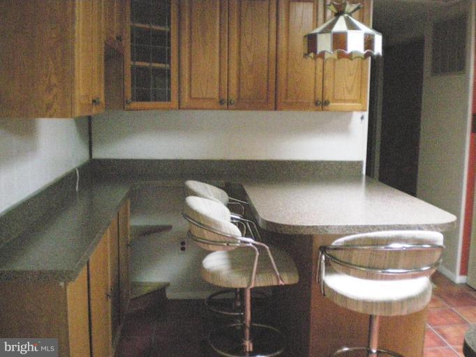 6307 Chesworth Road Catonsville, MD 21228 - Photo 8 of 18 Eating area in updated kitchen space with storage