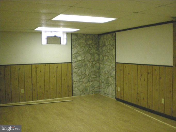 6307 Chesworth Road Catonsville, MD 21228 - Photo 10 of 18 Finished clubroom area with Pergo flooring