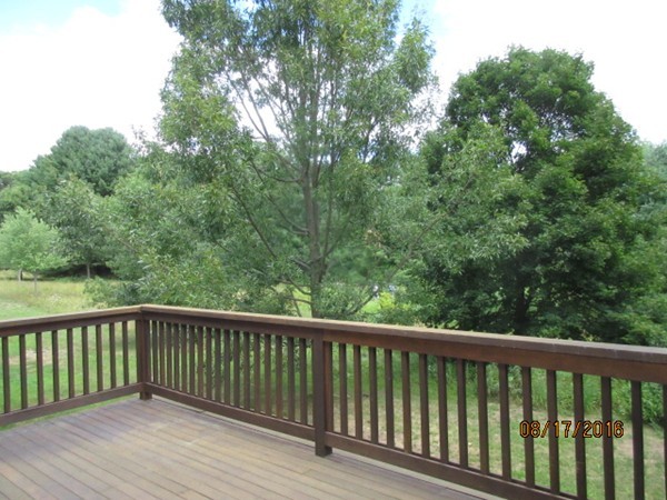 153 Nobscot Road, Unit 153 Sudbury, MA 01776 - Photo 18 of 18 a view of balcony with wooden floor