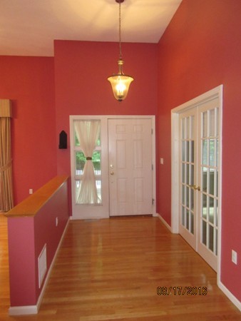 153 Nobscot Road, Unit 153 Sudbury, MA 01776 - Photo 9 of 18 a view of a room with wooden floor