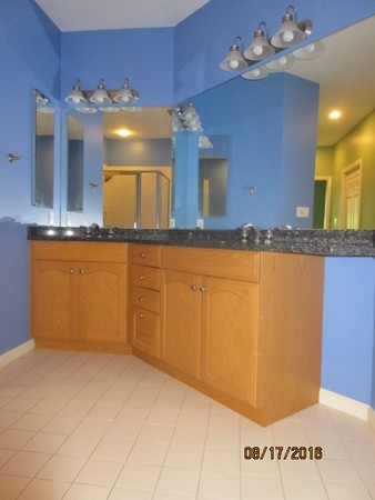 153 Nobscot Road, Unit 153 Sudbury, MA 01776 - Photo 10 of 18 a view of a kitchen with a sink
