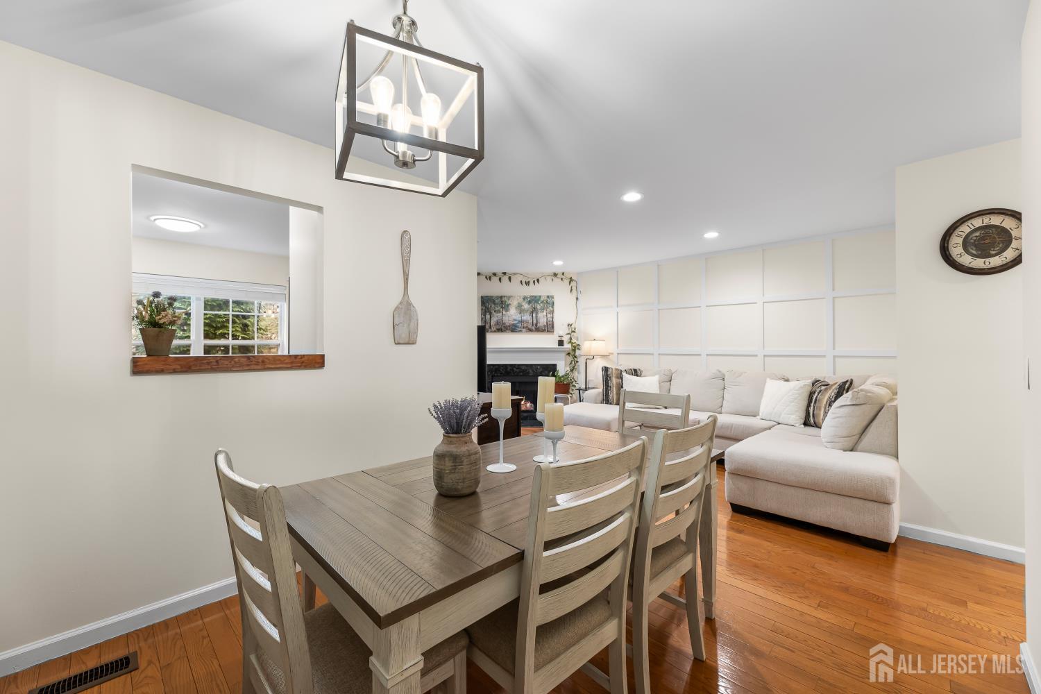 7 Edith Drive Somerset, NJ 08873 - Photo 14 of 49 a view of a dining room with furniture and a chandelier