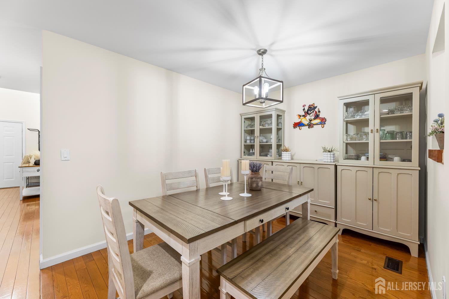 7 Edith Drive Somerset, NJ 08873 - Photo 15 of 49 a view of a dining room with furniture and chandelier