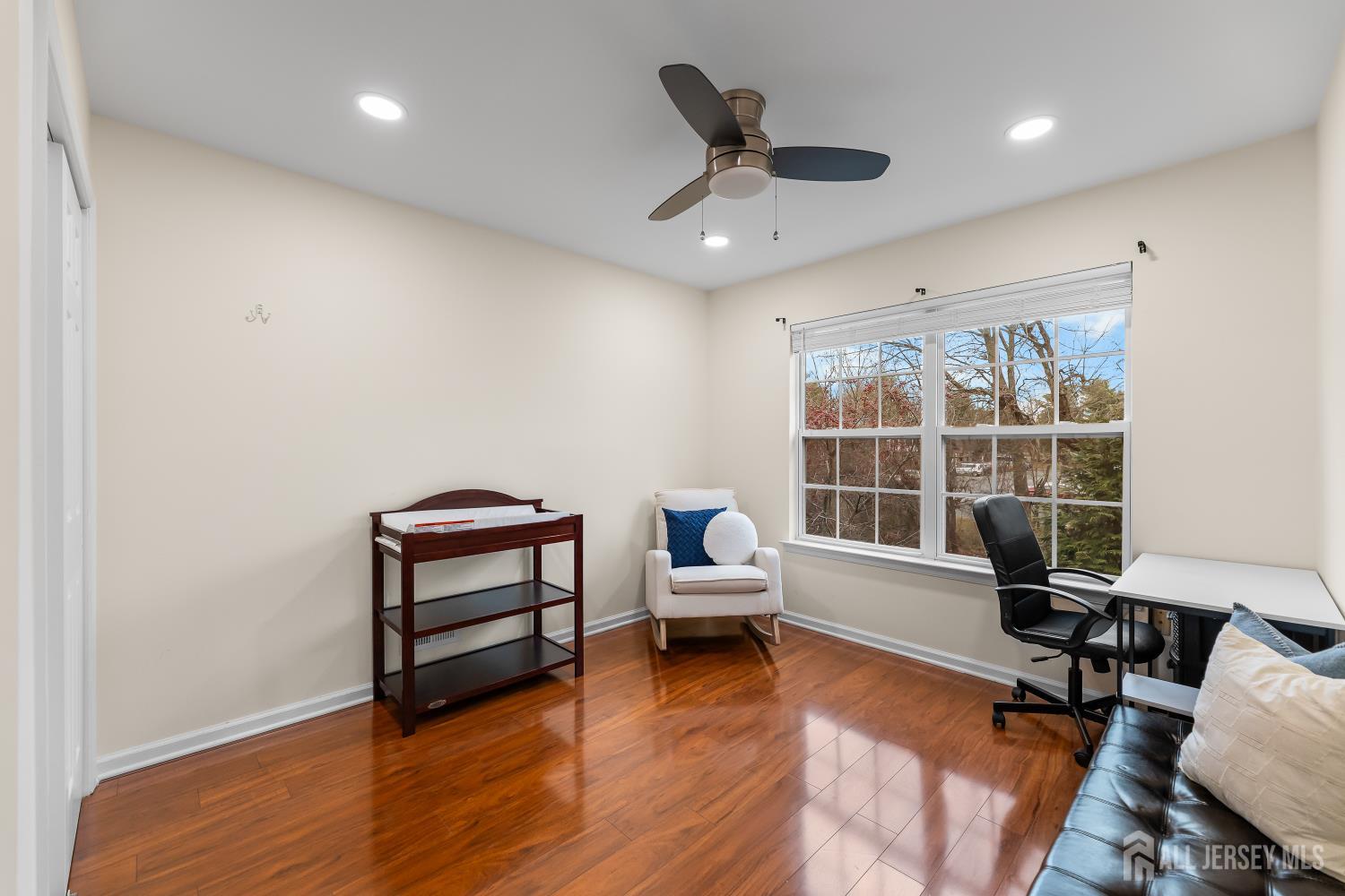 7 Edith Drive Somerset, NJ 08873 - Photo 19 of 49 a living room with furniture and a large window
